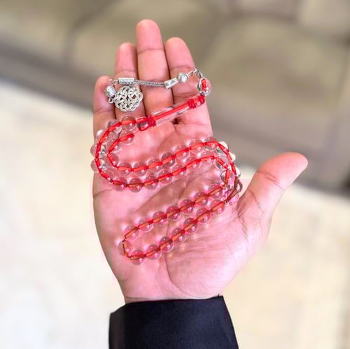 سبحة من بكلايت باللون الاحمر الشفاف