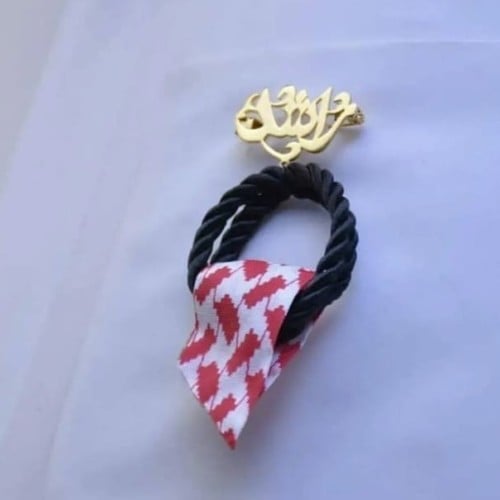 بروشت ولادي على شكل شماغ