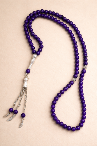 سبحه حجر صناعي العدد 99 خرزه اللون موف