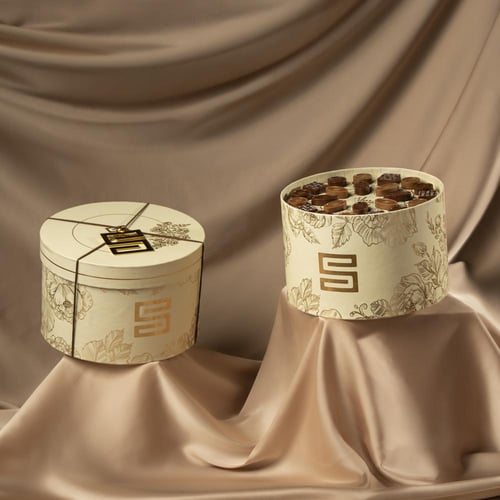 Round Box Uncover Swiss Chocolate 23 Pcs - بوكس دا...