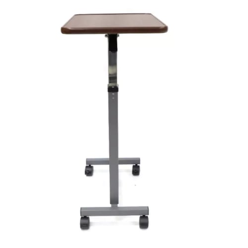 طاولة طعام فوق السرير