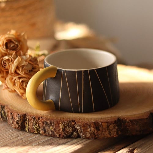 Yellow handle mug