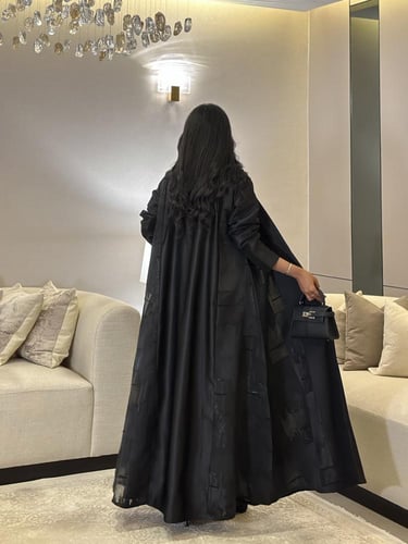 ‎ عباية تفتة تايواني مع اورجانزا اسود مبطن القصة ك...