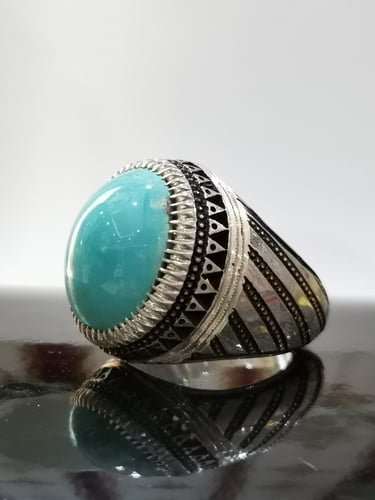 سخاتم الفضة بحجر فيروز نيشابوري ايراني بصياغة عباس...