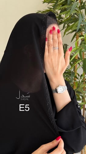 بكج طرح سوداء بنقشه