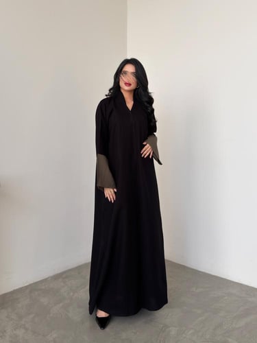 عباية عملية مع اكمام حرير مغسول