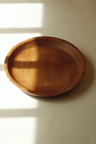 صحن تقديم خشبي مستدير