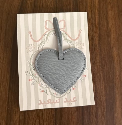 عيديات ميداليه جلد نحت فيها حسب الطلب