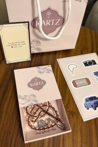 مسبحة KARTZ بني بشفاف