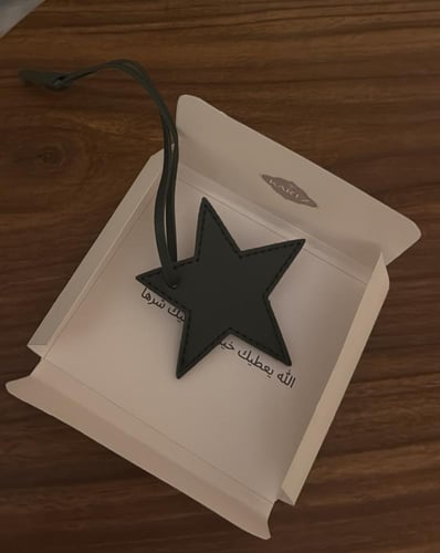 نحت على ميدالية مع كيس رجالي وستيكرات وعبارة اهداء