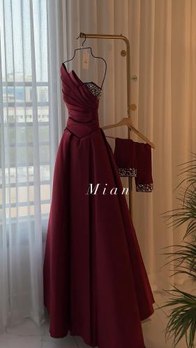 فستان اكرام عنابي