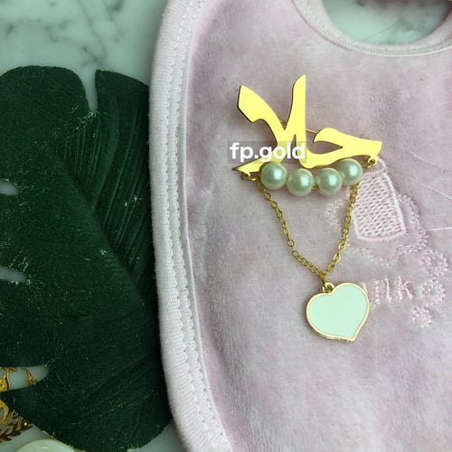 بروش مطلي ذهب مع لولو وقلب