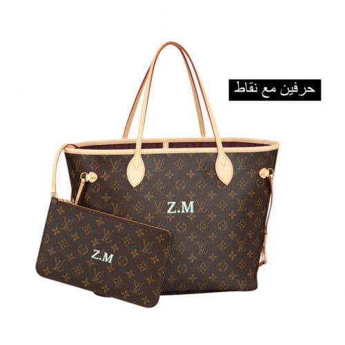 كتابة أحرف على شنط LV