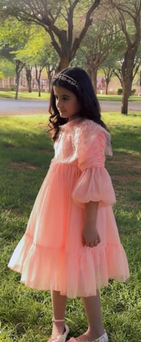 فستان خربزي بياقه شك يدوي