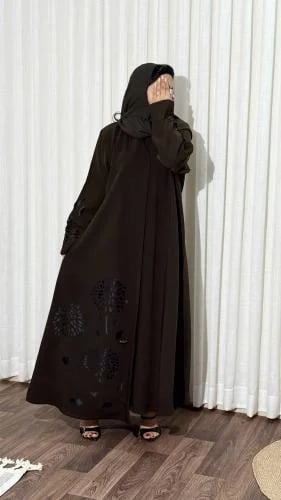 Women's brown embroidered abaya with elegant ceramic design