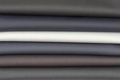 قماش شتوي زيتي منقط بني