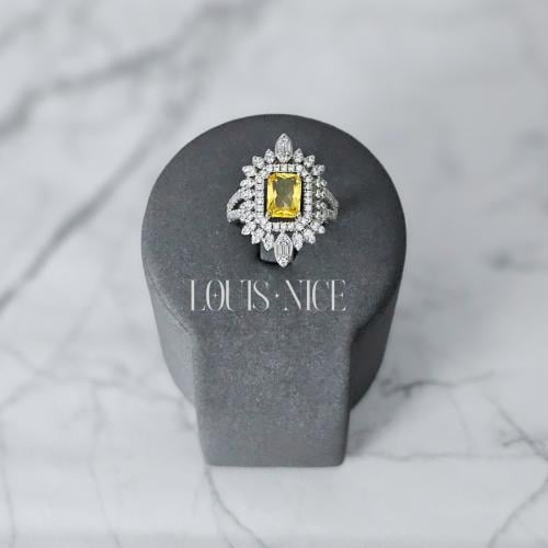 خاتم زركون باللون الفضي مع الاصفر