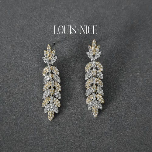 طقم زركون باللون الفضي والذهبي بدقة الألماس