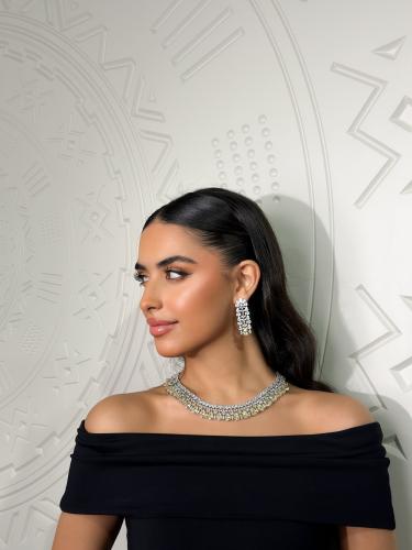 طقم زركون باللون الفضي والاصفر بدقة الالماس