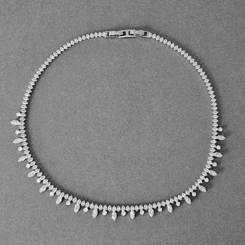 طقم زركون فضي بفواصل متدلية