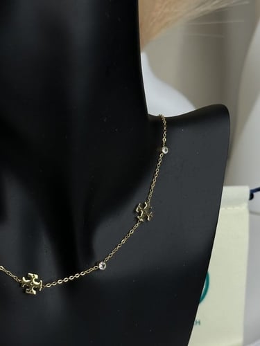 سلسال TORY BURCH معدن ذهبي