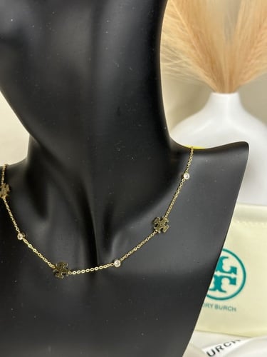 سلسال TORY BURCH معدن ذهبي