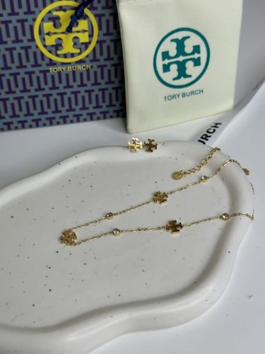 سلسال TORY BURCH معدن ذهبي