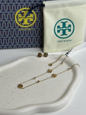 سلسال TORY BURCH معدن ذهبي