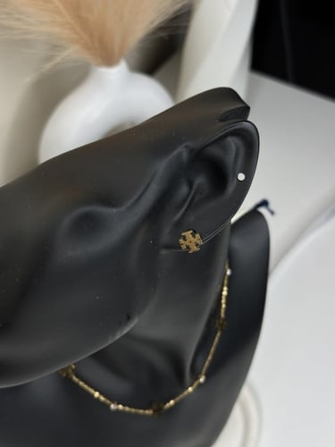 سلسال TORY BURCH معدن ذهبي