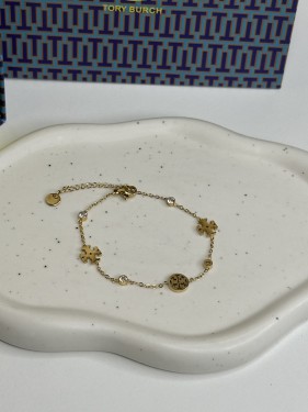 إسوارة TORY BURCH معدن ذهبي
