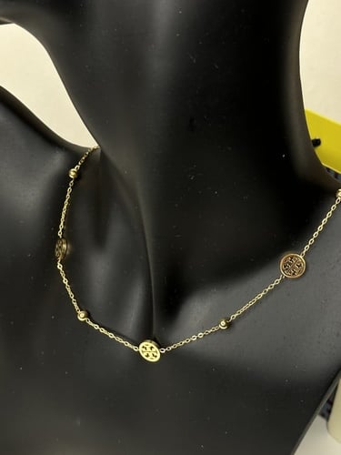 سلسال TORY BURCH معدن ذهبي