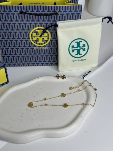 سلسال TORY BURCH معدن ذهبي