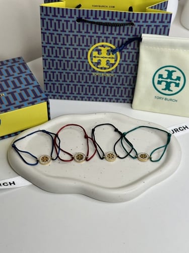 إسوارة TORY BURCH معدن ذهبي خيط