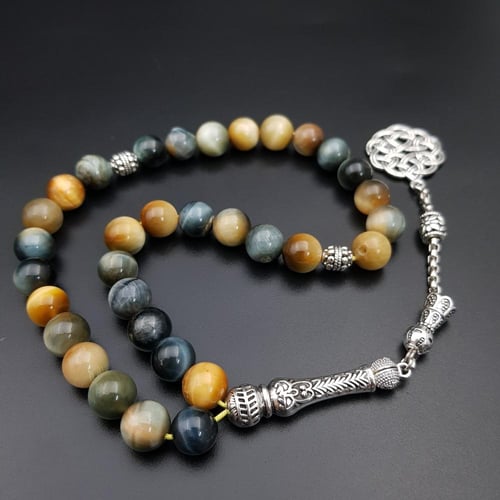 سبحة عين النمر التايجر الوان