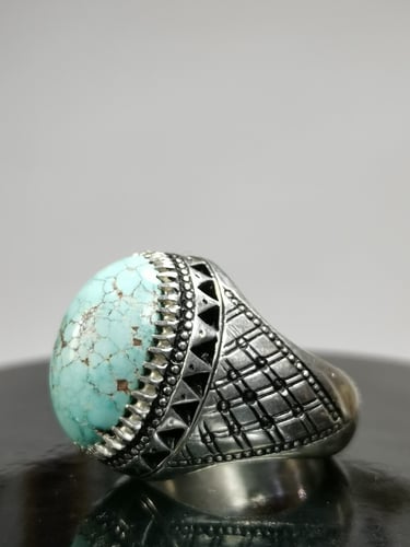 خاتم الفضة بحجر فيروز نيشابوري ايراني بصياغة الأست...