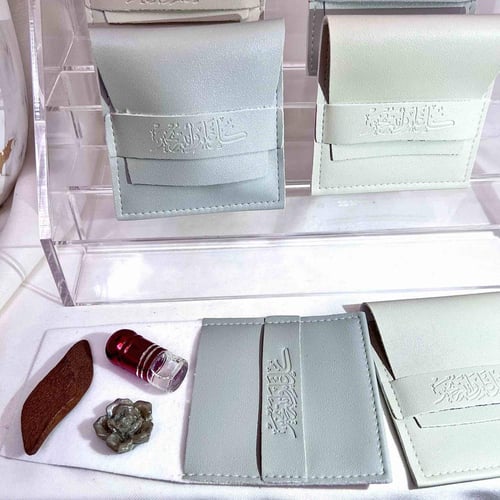 توزيعات العيد حقائب جلد مميزه