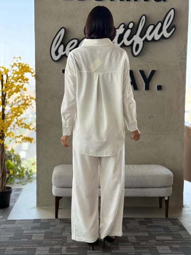 طقم كتان مخرم بتخيلات الجينز البنطلون كتان مزين بخ...