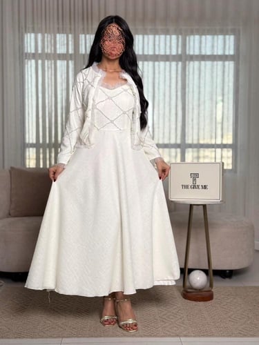 فستان "لؤلؤة" الفاخر بتصميم قطعتين وياقة كشكش ناعم...