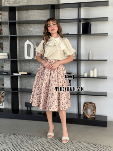 طقم بلوزه وتنوره بخامة بلوزه ستان مزين بلوول