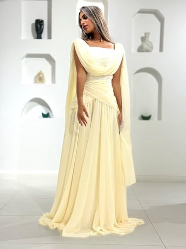 فستان سهرة اصفر فاتح بكاب شيفون