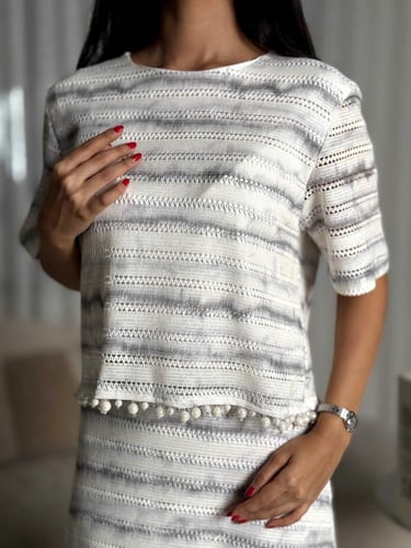 طقم مزين بأطراف لول