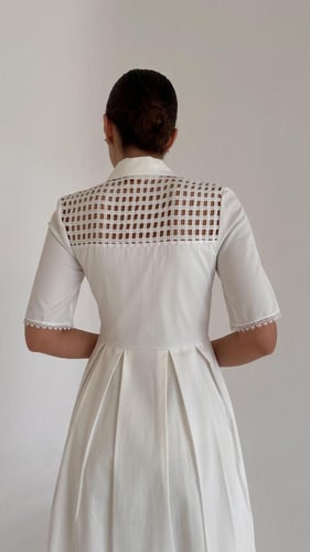 White dress with pearls