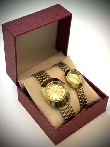 عشرة عطور وساعتين شبيهه الرادو ذهبيه