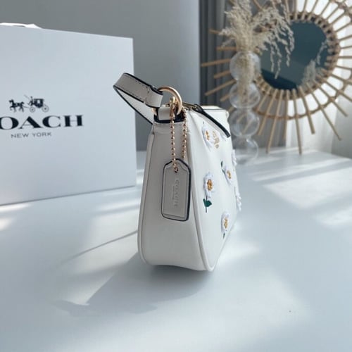 Coach wallet with daisy embroidery