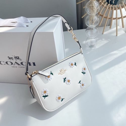 Coach wallet with daisy embroidery