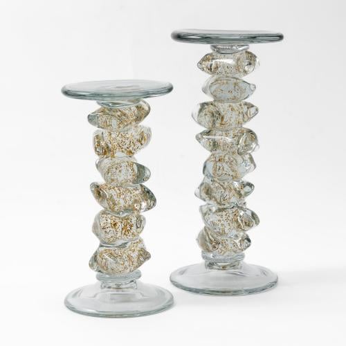 شمعدان زجاجي شفاف و ذهبي لامع