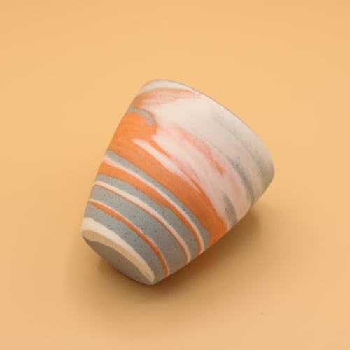 كوب رصاصي مع تموجات مختلفه