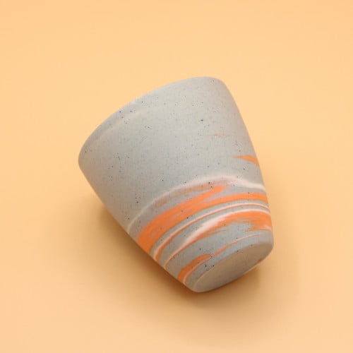 كوب رصاصي مع تموجات مختلفه