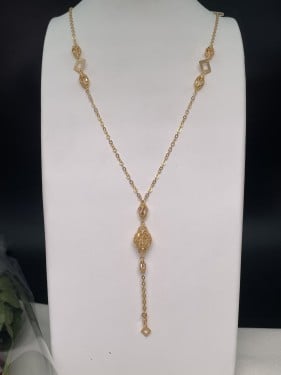 سبحة ذهبية بنقوش كروية ومربعات هندسية عيار 21