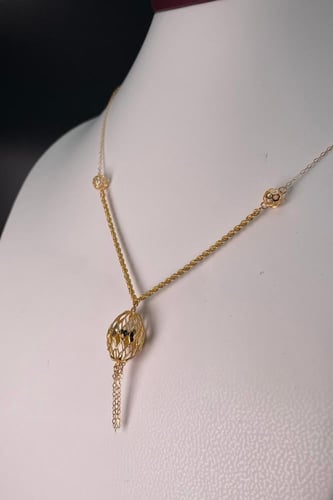 سبحة ذهبية بزخارف كروية عيار 21